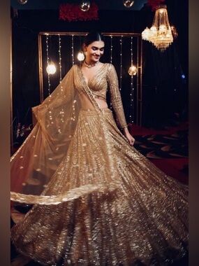 Gold Glitter Embroidered Bridal Net Heavy Lehenga Set